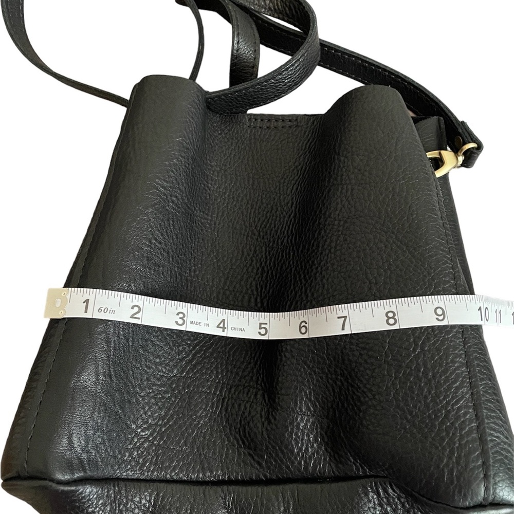 Black genuine leather purse with shoulder strap bucket style